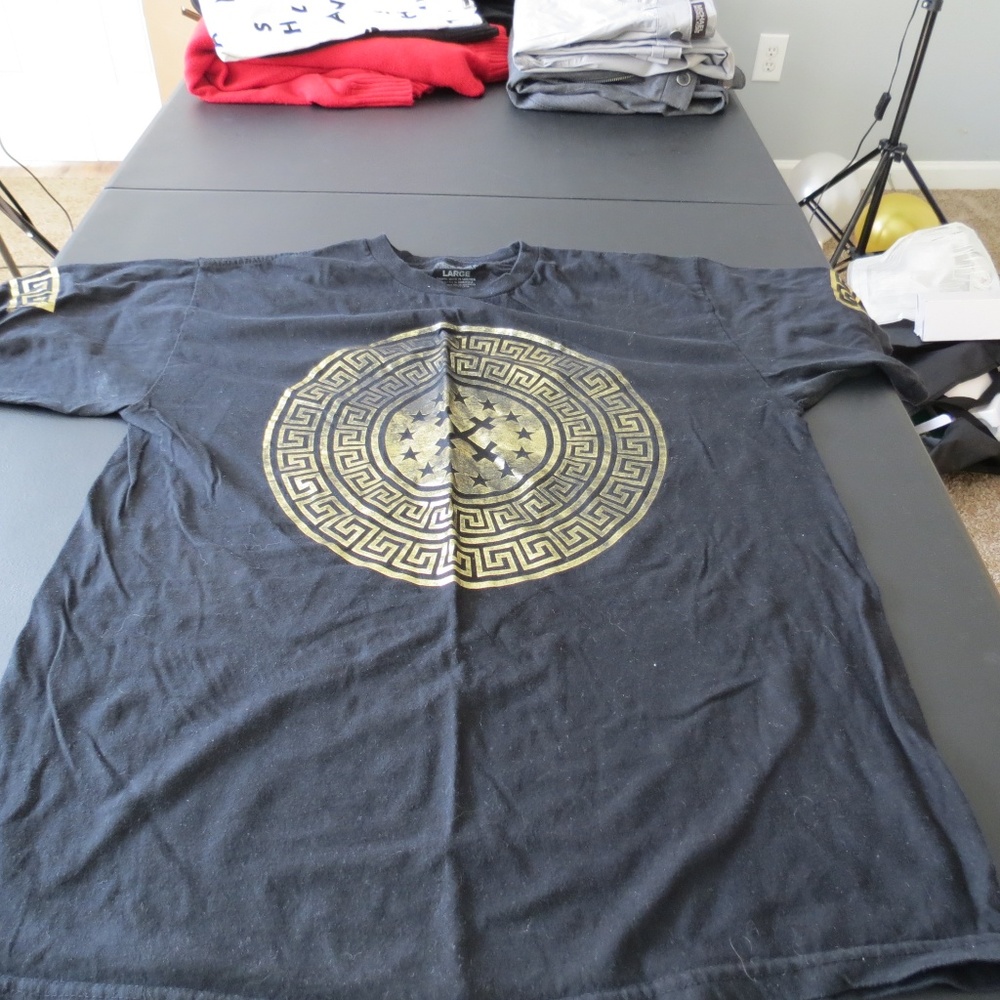 Black Shirt with Gold Emblem
